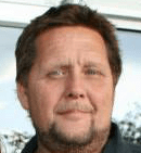 A portrait image of the business owner, Eric